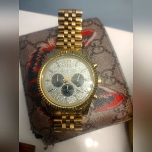 Men's Micheal kors watch. Gold. Stone face. Beautiful watch!!